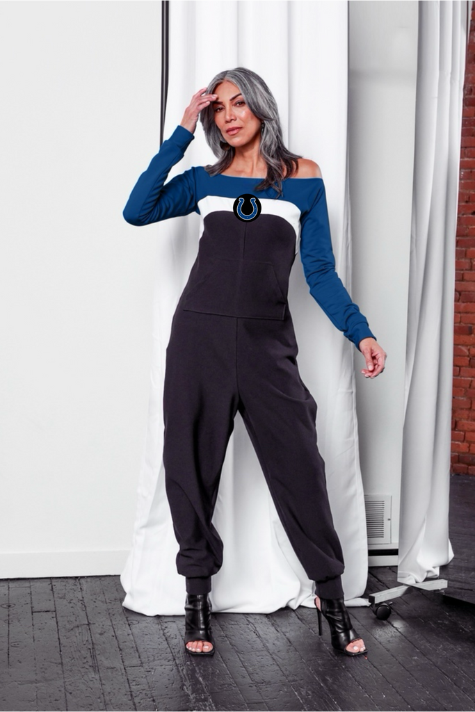 Off shoulder jumpsuit with blue sleeves, white stripe, black body, and Colts horseshoe logo on the center of the chest with front patch pockets.